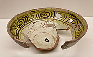 Bowl, Earthenware; white slip under transparent glaze running from pale greenish at center to strong yellow at rim