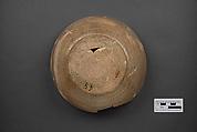 Bowl, Earthenware; buff slip, underglaze painted in black slip and polychrome pigments under transparent glaze