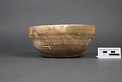 Bowl, Earthenware; buff slip, underglaze painted in black slip and polychrome pigments under transparent glaze