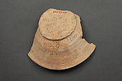 Fragment of a Bowl, Earthenware; reddish buff body, white slip with yellow-black decoration under glaze