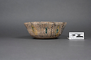 Bowl, Earthenware; painted in black slip and polychrome pigments under a transparent colorless glaze (buff ware)