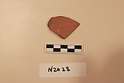 Ceramic Fragment, Earthenware; white slipped, slip-painted in dark brown under a yellow glaze