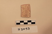 Ceramic Fragment, Earthenware; white slipped, slip-painted in dark brown under a yellow glaze