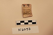 Ceramic Fragment, Earthenware; white slipped, slip-painted in dark brown under a yellow glaze