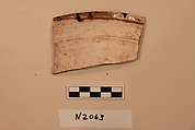 Ceramic Fragment, Earthenware; white slipped, slip-painted under a yellow glaze