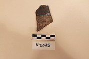 Ceramic Fragment, Earthenware; dark brown slipped, slip-painted in  white under a colorless glaze