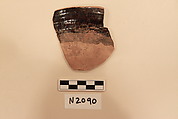 Ceramic Fragment, Earthenware; dark brown slipped, slip-painted in white under a colorless glaze