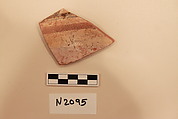 Ceramic Fragment, Earthenware; white slipped, in glaze painted in brown, yellow and green