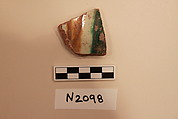 Ceramic Fragment, Earthenware; white slipped,incised and splashed under a colorless glaze