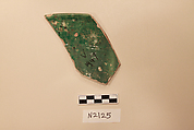 Ceramic Fragment, Earthenware; white slipped, with a green glaze