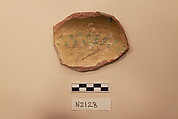 Ceramic Fragment, Earthenware; white slipped, with a green glaze.