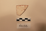 Ceramic Fragment, Earthenware;  white slip, slip painted under a colorless glaze.