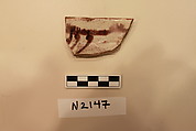 Ceramic Fragment, Earthenware; white slipped, painted with dark brown glaze.