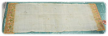 Gold Bordered Napkin with Pavillions, Cotton; embroidered in gold and silver metal wrapped thread