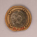 Disk, Bone; incised and inlaid with paint
Lead: stamped