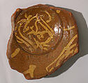 Fragment of a Bowl, Earthenware; slip-painted under transparent glaze