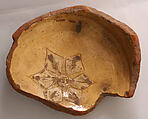 Fragment of a Bowl, Earthenware; incised decoration through white slip and coloring under transparent glaze