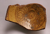 Fragment of a Bowl, Earthenware; incised decoration through white slip and coloring under transparent glaze
