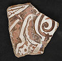 Fragment of Dish, Stonepaste; glazed and luster-painted with scratches on the luster