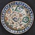 Dish, Stonepaste; underglaze painted in black, blue, and green with red and yellow slips