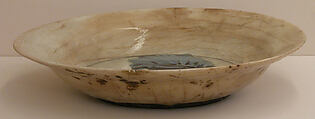 Dish, Stonepaste; underglaze painted in black, blue, and manganese purple
