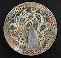 Dish, Stonepaste; underglaze painted in black, blue, and green with red and yellow slips