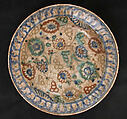 Dish, Stonepaste; underglaze painted in black, blue, and green with red and yellow slips