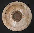 Dish, Stonepaste; underglaze painted in black, blue, and green with red and yellow slips