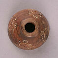 Spindle Whorl, Bone; tinted, incised, and inlaid with paint