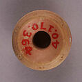 Spindle Whorl, Bone; tinted, incised, and inlaid with paint