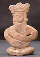 Figurine of a Seated Personage with Folded Arms and Elaborate Headdress, Earthenware; unglazed