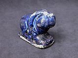 Bath Scraper in the Shape of a Lion, Stonepaste; molded, incised, glazed in transparent blue