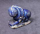 Bath Scraper in the Shape of a Lion, Stonepaste; molded, incised, glazed in transparent blue