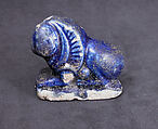 Bath Scraper in the Shape of a Lion, Stonepaste; molded, incised, glazed in transparent blue