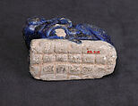 Bath Scraper in the Shape of a Lion, Stonepaste; molded, incised, glazed in transparent blue