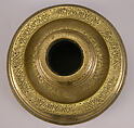 Candlestick with Repeating Seated Figure, Inscription, and Flowers, Brass; cast, engraved, and originally inlaid with silver