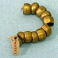 String of Beads, Gold leaf, wood