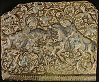 Frieze Tile with Two Hunters, Stonepaste; molded, inglaze painted in blue and turquoise, luster-painted on opaque white glaze