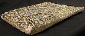 Frieze Tile with Two Hunters, Stonepaste; molded, inglaze painted in blue and turquoise, luster-painted on opaque white glaze