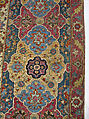Carpet, Cotton (warp and weft), wool (pile); asymmetrically knotted pile 