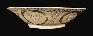 Bowl depicting a Man holding a Cup and a Flowering Branch, Earthenware; luster-painted on opaque white glaze