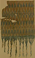 Textile Fragment, Cotton; plain weave, resist-dyed (ikat), embroidered