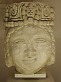 Head from a Figure with a Beaded Headdress, Fossiliferous limestone; carved, drilled