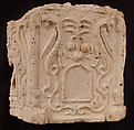 Fragment of a Base with Pair of Peacocks flanking a Palm Motif, Stucco; molded