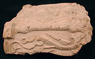 Fragment of a Base with Pair of Peacocks flanking a Palm Motif, Stucco; molded