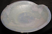 Plate, Earthenware; bluish glaze over grayish gritty body