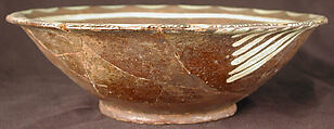 Bowl, Earthenware; purplish slip and white slip decoration under transparent glaze