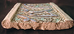 Tile, Stonepaste; modeled, inglaze painted in blue and luster-painted on opaque white glaze