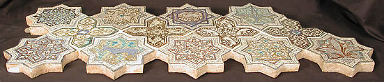 Star-Shaped Tile, Stonepaste: inglaze painted in blue and turquoise and luster-painted on an opaque white glaze