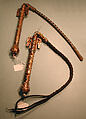 Whip, One of a Pair, Silver; fire-gilded with horse head terminals, stamped beading, silver shot and twisted wire, cabochon turquoises and glass beads, with a leather attachment